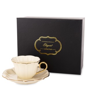 Filiżanka z porcelany beżowo złota w ozdobnym opakowaniu  176553