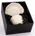 Filiżanka z porcelany beżowo złota w ozdobnym opakowaniu  176553