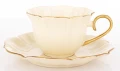 Filiżanka z porcelany beżowo złota w ozdobnym opakowaniu  176553